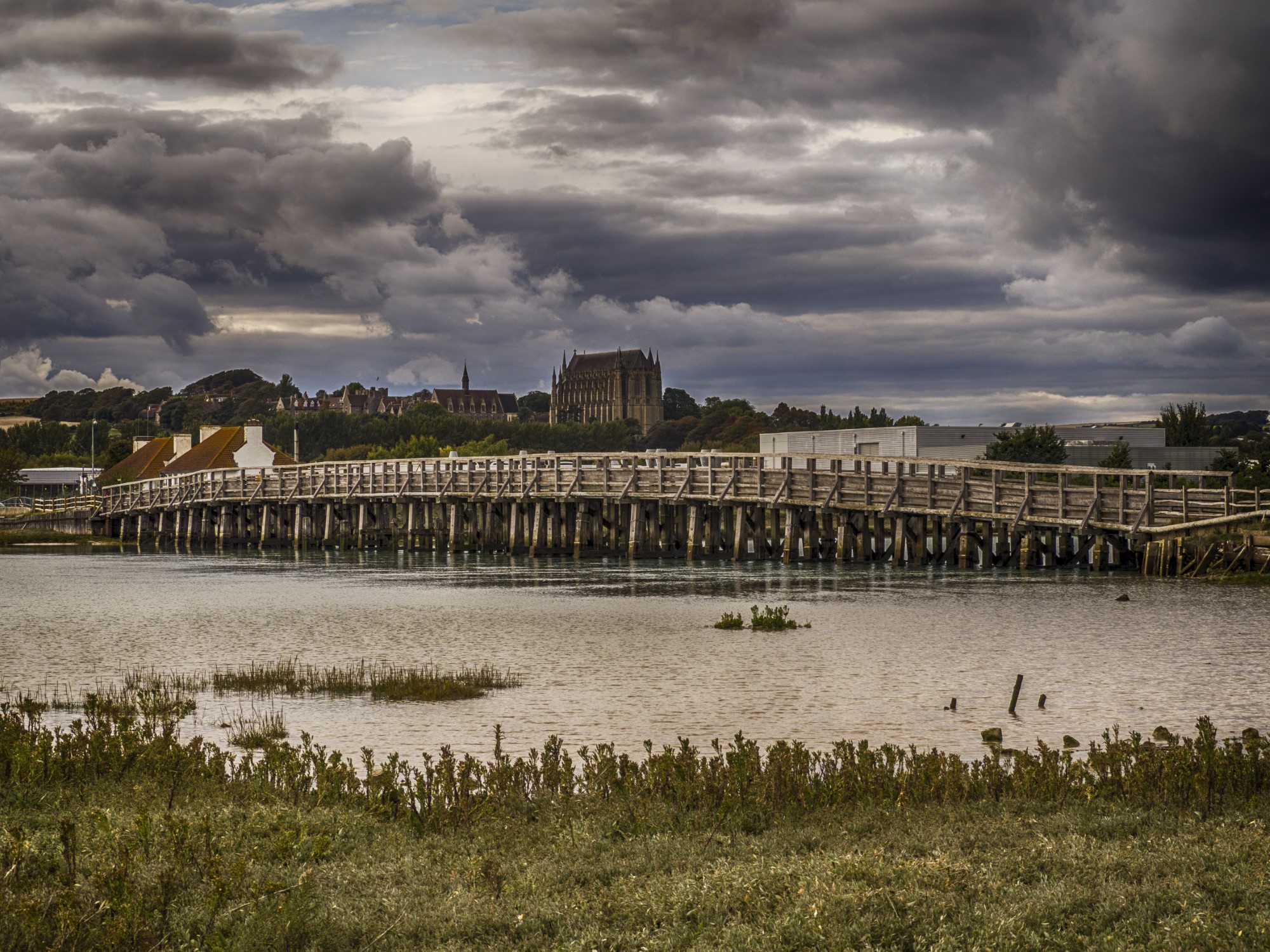 The Old Toll Bridge over the River Adur, Shoreham-by-Sea. Lancing College in the background.